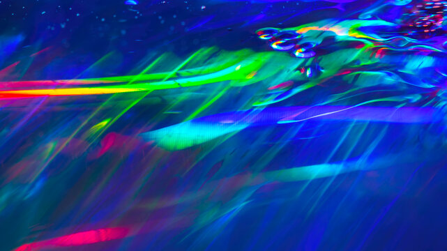 Abstract holographic neon waves, colorful rainbow liquid lights, vibrant glowing psychedelic background