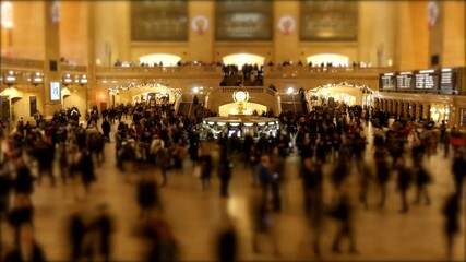 A busy city intersection with moving people commuting to workplace in urban metropolis 