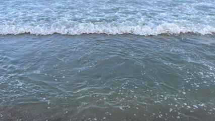 Ocean Waves on Sandy Shore