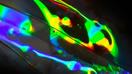 Abstract holographic neon rainbow waves background, colorful psychedelic liquid light reflections texture, vibrant glowing futuristic design