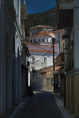 a narrow street in the city