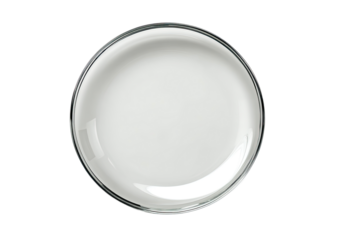 A high-angle, full shot of a round, empty, glossy white plate or dish.  The plate has a clear, thin rim