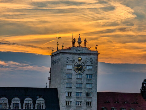 Kroch High-rise (Krochhochhaus) at sunset at Augustusplatz in Leipzig, Germany. The reinforced concrete building was designed as a clock tower, crowned by a clock and two bellmen.