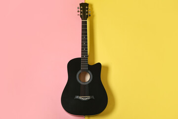 Obraz premium Modern black guitar on color background