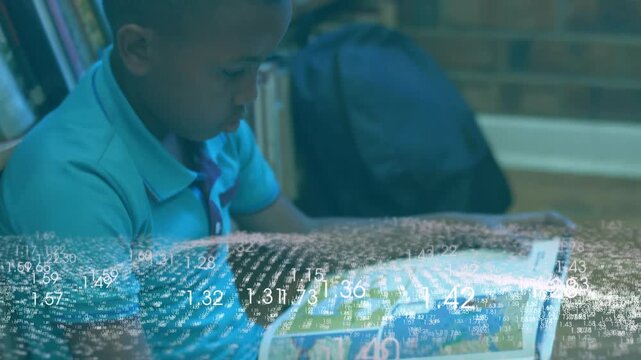 Schoolboy turning atlas pages in library studying map for education as digital data animating