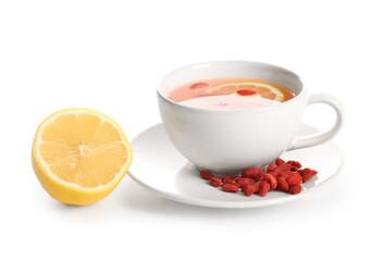 Cup of hot goji tea with lemon and berries on white background