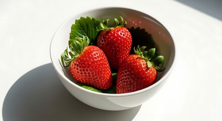Fresh Strawberries in White Bowl, Natural Light, Close-Up, Healthy Snack, Summer Delight.