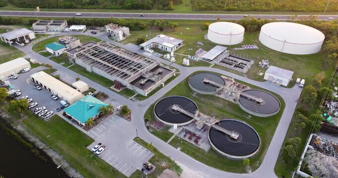 Industrial water treatment facility with water cleaning cisterns and piping system.