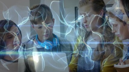 Students leaning around tablet tapping screen gesturing waveforms noting ideas fueling education - Powered by Adobe