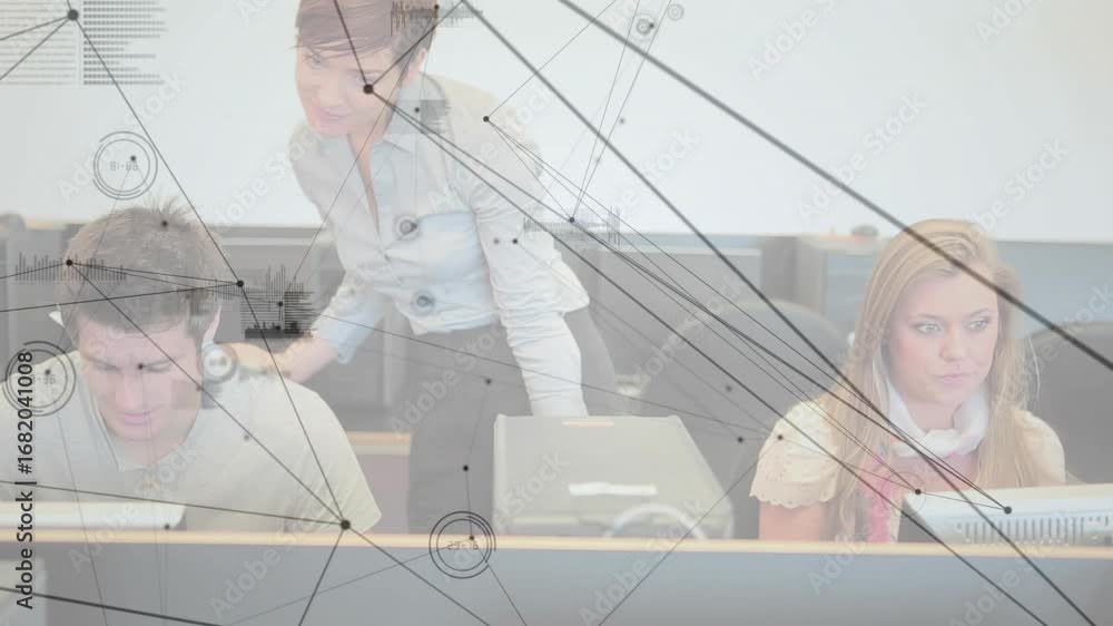 Poster instructor entering computer lab guiding students pointing to screens and sharing info for learning