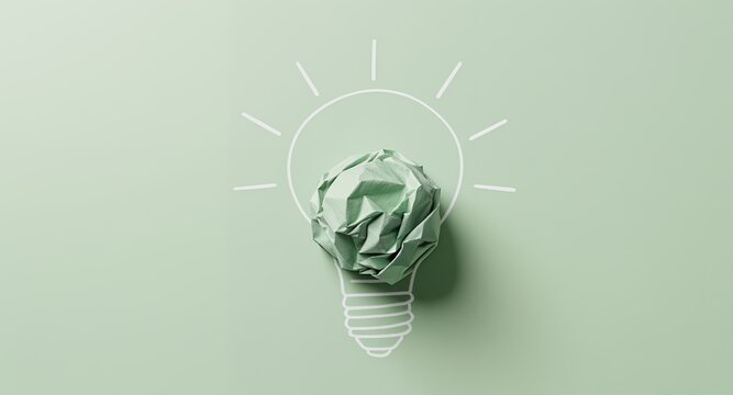 Creative Idea Concept Crumpled Paper Light Bulb on Green Background