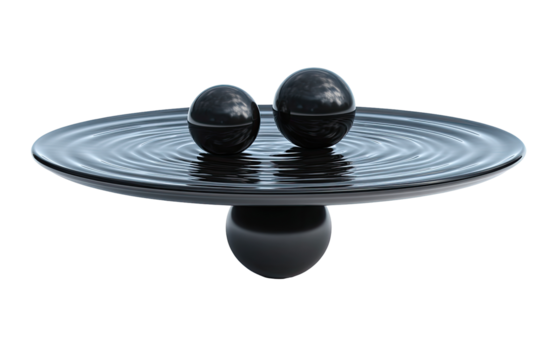 Two black spheres rest on a dark liquid surface, creating ripples on a flat, dark plate.  A mirrored reflection beneath
