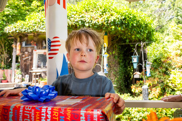 A young toddler enjoys his birthday party in Washington.