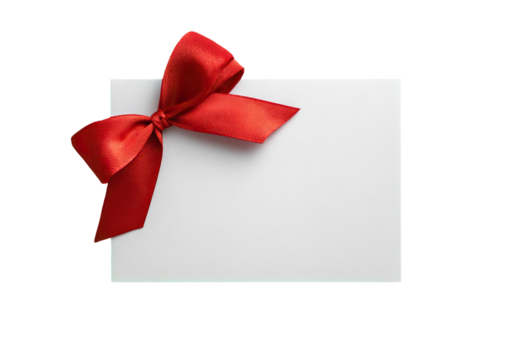 A rectangular white card with a vibrant red satin ribbon bow positioned in the top right corner