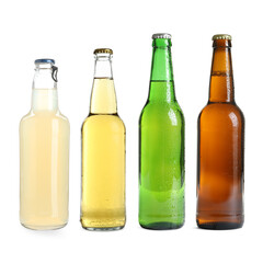 Different types of fresh beer in glass bottles isolated on white, set