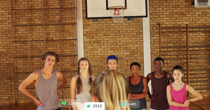 Receiving coach guidance basketball teammates in sportswear in school gym, with hoop - Powered by Adobe