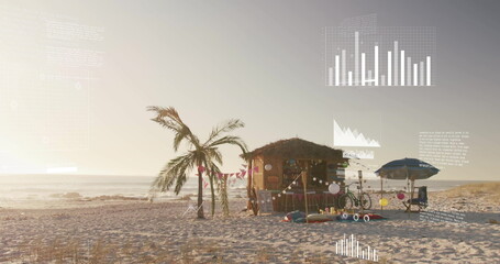 Standing thatched shack reflecting sunrise glow on sandy shore, with surfboards and bicycle