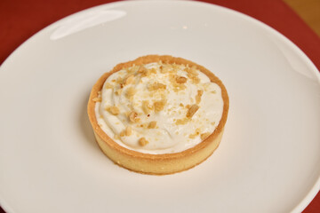 Indulgent and Delicious Creamy Dessert Tart with a Delectable Crumbled Topping on Top