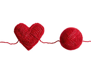 A red heart and ball of yarn connected by threads against a black background
