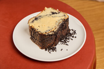 A Delectable Slice of Marble Cake Served on a Stylish Plate, Perfect for Any Occasion