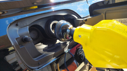Fueling a car at a self-service gas station

