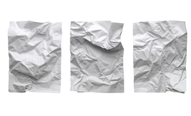 Crumpled white paper sheets arranged in a horizontal row.  Three rectangular sheets of paper are tightly crumpled, showing texture and folds