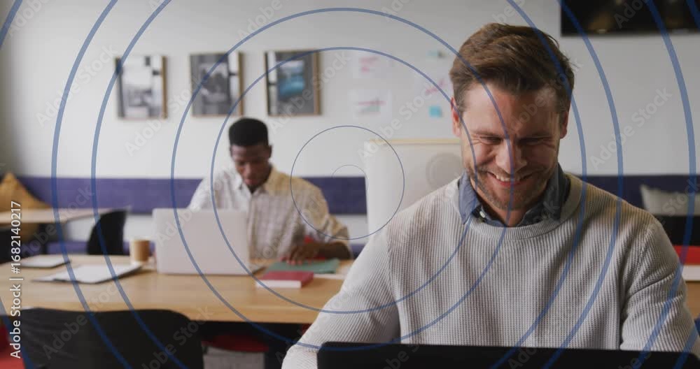 Poster circle overlay guiding business colleagues typing on laptops then sorting papers and jotting notes