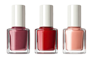 Three nail polish bottles in shades of red and pink