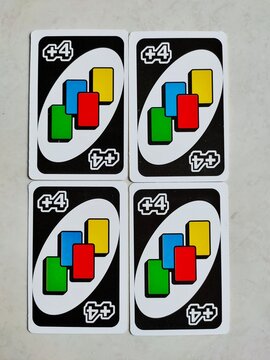 Malang, Indonesia - April 12, 2024: four cards of Plus four or +4 uno cards. When luck is on your side.