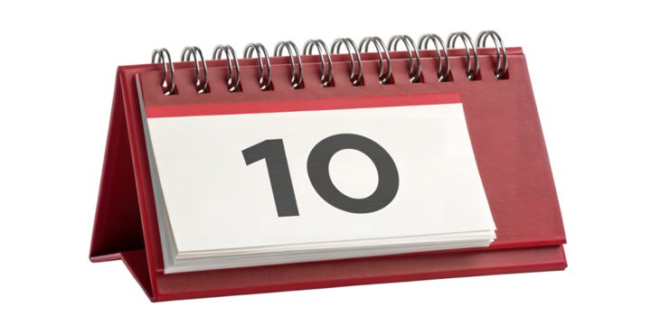 Calendar Page 10: An eye-level shot of a classic desk calendar, featuring the number 10 prominently displayed, symbolizing a specific day or date for events.