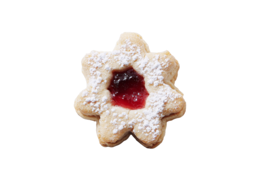 A cookie with a white powdered top and a red center