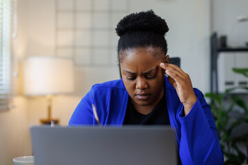 Overworked tired african female worker holding glasses feel eye strain fatigue after computer work multiracial woman suffer from pain in dry irritated eyes bad blurry vision eyesight problem
