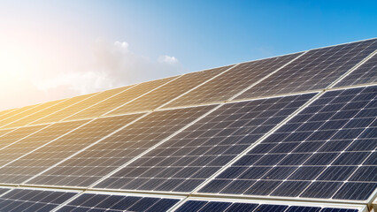 Solar panels under a clear blue sky for renewable energy generation