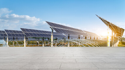 Solar panels array in an open area under a clear sky