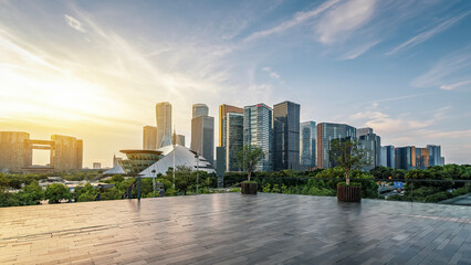 Modern city skyline with tall buildings under a clear sky
