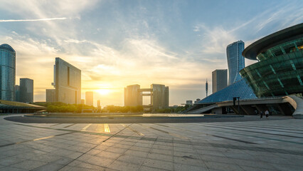 Sunset view of modern city skyline with tall buildings