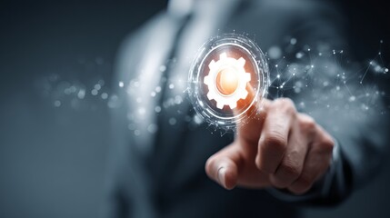 Businessman's finger activating glowing digital gear interface in modern technology concept, symbolizing innovation and forward momentum.