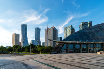 Modern city skyline with contemporary buildings under a clear blue sky