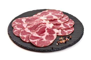 Capocollo Slices on Slate, isolated on white background