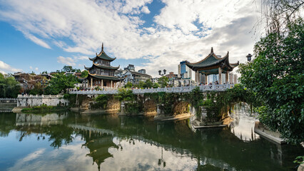 Traditional Chinese Pavilion by the Calm Lake with Clear Reflections