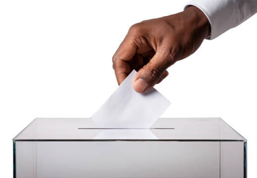 A hand inserts a ballot into a transparent voting box