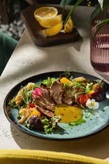 Duck fillet salad with beetroot and citrus, bright natural lighting, angled composition