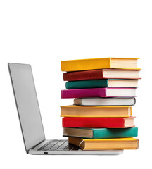 Laptop with a stack of colorful books