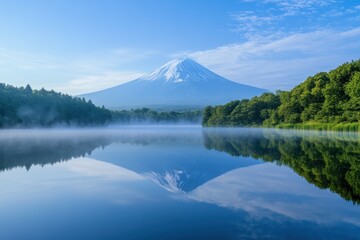 Obraz premium Mount Fuji above quiet reflective lake 