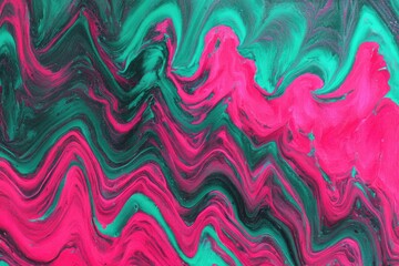 Abstract swirling pink and teal paint