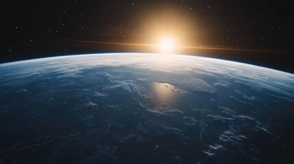 Breathtaking view of earth from space with a vibrant sunrise illuminating the horizon and starry sky above the planet