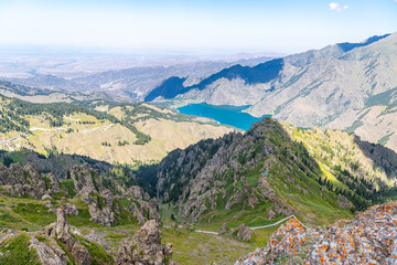 Fototapeta premium View from the top to natural landscape of Heaven Lake of Celestial Mountains in Xinjiang China, copy space for text