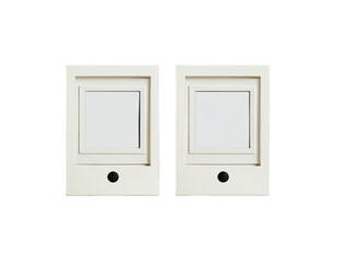 Two beige electrical wall switches, side-by-side.  Each switch is a square, framed in a slightly larger square, with a small round hole/button in the center. 