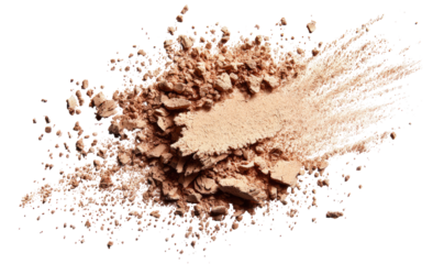 Light beige powder exploding in a chaotic, textured design