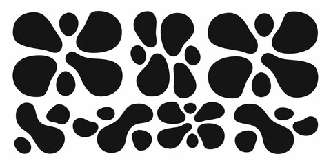 Abstract black organic shapes arranged in a repeating pattern on a white background